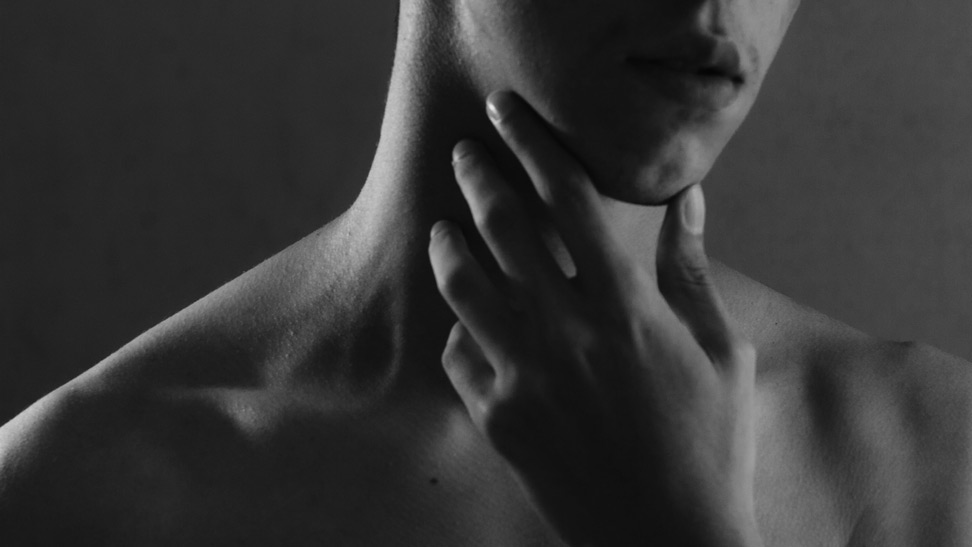 Image of art with hand cuffs.